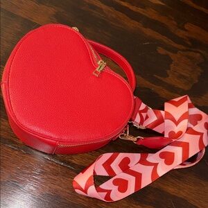 Heart-Shaped Red Bag with Patterned Strap